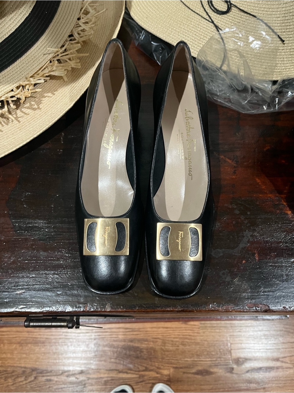 Salvatore Ferragamo Black Leather Pumps with Gold Plaque